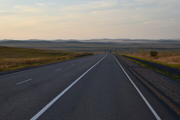 Fototapeta premium Country road. Siberian scenery. Republic of Khakassia, Russia