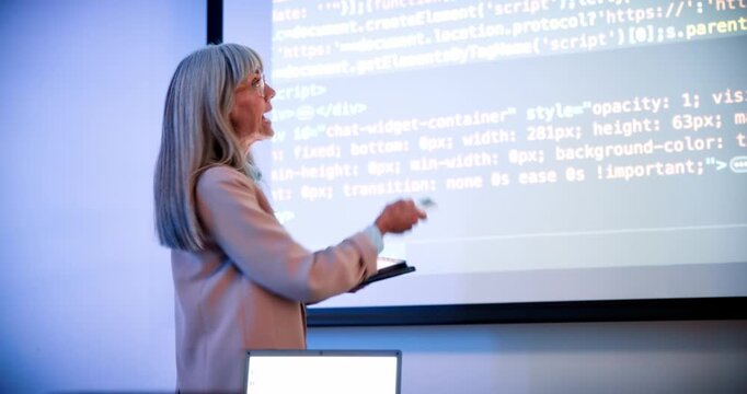 Woman, tablet and lecture with board at college in classroom, remote and coding course for education. Person, IT professor and students with tech, learning and screen for programming in university