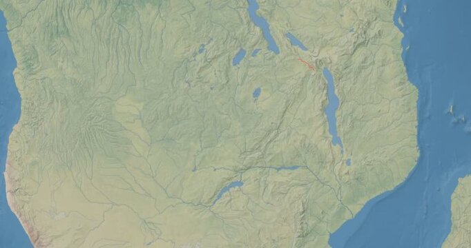 Zambia on Globe. Zoom into the country with Earth spinning on dark background. Physical world map with Zambia and label on it. Country view animation.