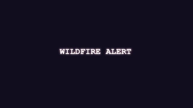 Urgent wildfire alert warning text decrypting with glowing neon letters against a black background for emergency news broadcast
