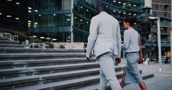 Smile, business and people walking in city for travel, journey and steps with lawyer team. Attorney, talk and morning commute in town for collaboration, legal representative and stairs outdoor