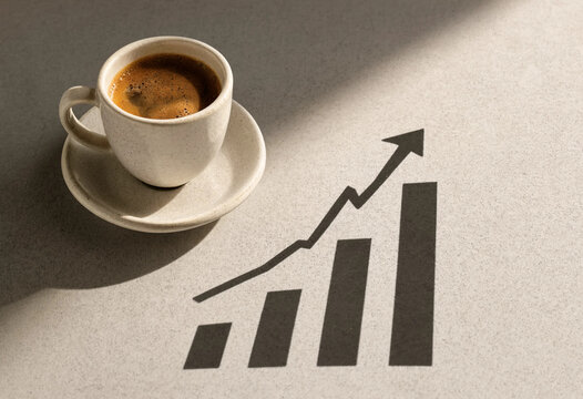 Cup of Espresso Coffee with Financial Growth Chart Graphic