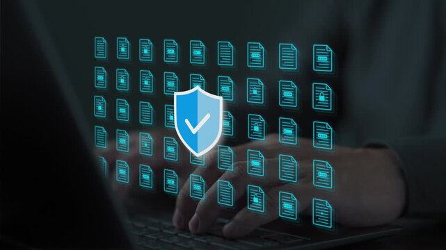 Data security specialist protecting sensitive corporate documents with firewall shield interface on laptop. Concept of information privacy, encryption, and digital asset defense.