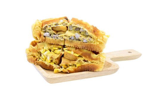 Honeycomb cake ( thai waffle ) in wood plate on white background close up,street food thailand,isolated