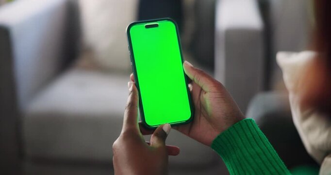 African American Hands Using Smartphone with Green Screen for Interactive Digital Content Display