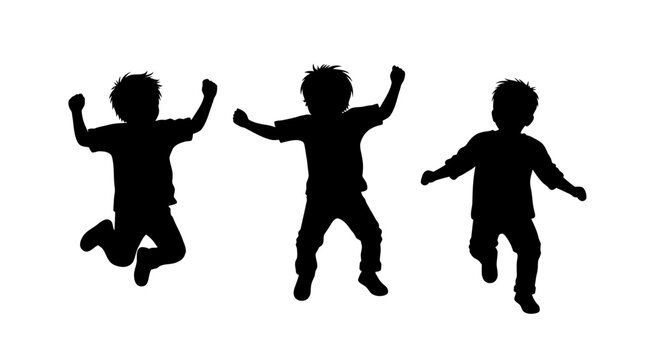Silhouettes of three energetic young boys jumping with joy.
