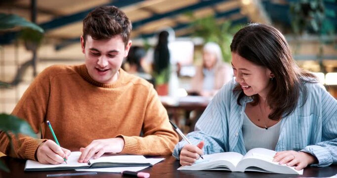 People, students or friends with books in study or university library for learning together. Happy, man and woman writing with smile or notebooks for fun assignment, project or education in academy