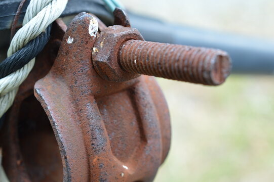 Close Up of Rusted Bolt and Nut on Industrial Equipment