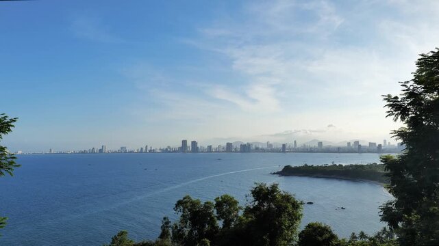 Da Nang city and ocean view from Son Tra hill. Da Nang cityscape with ocean and skyscrapers.