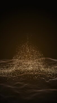 Vertical abstract gold particle wave with glowing glitter background
