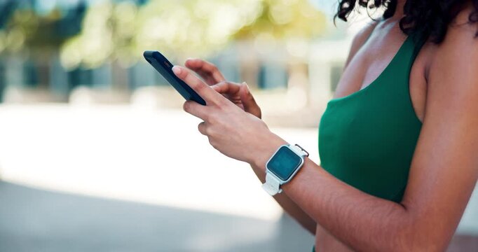 Phone, athlete and hands of woman in city with typing for texting, social media or chatting. Fitness, technology and female person scrolling on app for workout program on cellphone in urban town.