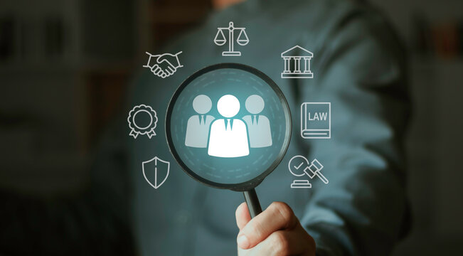 Human resource and legal investigation concept with magnifying glass focusing on people icon. Recruitment, background check, compliance audit, legal review and corporate risk management process.