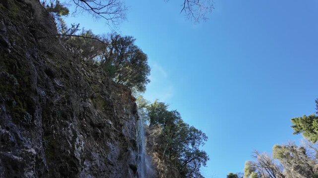 The Mill Creel Valley along the San Andras Fault looking ay a Yuhaaviatam Native American Indigenous Sacred waterfall on a Granite face near the Valley of the Falls on the Yucaipa Ridge,