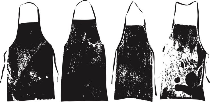 worn black aprons with stains, isolated on white background, kitchen and cooking accessories