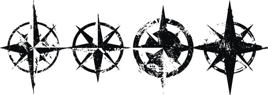 set of four grunge compass roses in black with various distressed textures and vintage