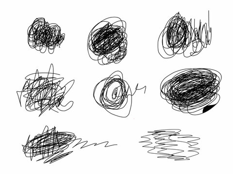 A collection of various chaotic black pen scribbles, tangles, and abstract doodle shapes isolated on a plain white background.