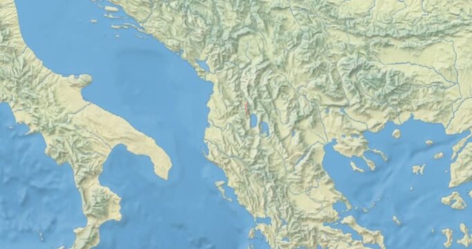 Albania on Globe. Zoom into the country with Earth spinning on dark background. Physical world map with Albania and label on it. Country view animation.