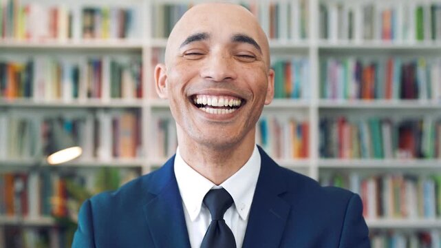 Happy, face and businessman with pride in library, knowledge and corporate lawyer with career growth. Laughing, attorney and person with job opportunity, legal books and research for case in law firm