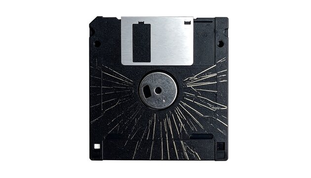 A black floppy disk with gold scratches on a white background
