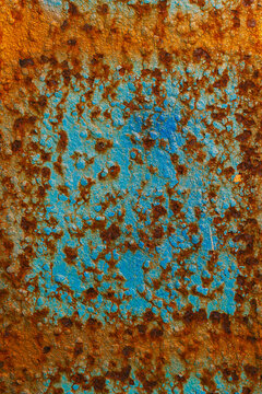 Rusty Metal Surface with Faded Blue Paint