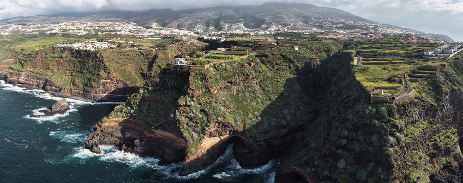 Aerial drone footage of the stunning coastal cliffs of Santa Ursula in North Tenerife, Spain, overlooking the Atlantic Ocean