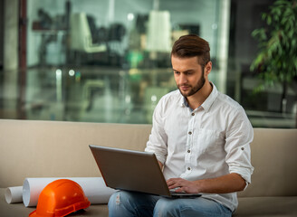 Fototapeta premium Architect Working On Laptop.