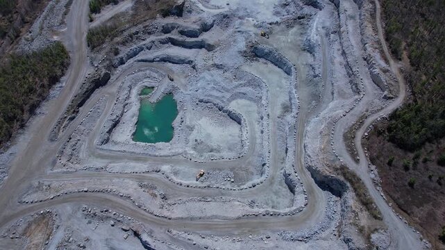 Rear earth development demand by memory chip makers. Aerial view of mining sector field. Concept of rapid expanding global market for semiconductors, and supply chains for AI systems and data centers.