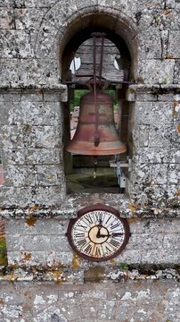 Ancient stone bell tower of Santa Marina de Augas Santas church
