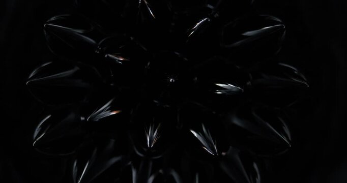 Magnetic fluid. Ferrofluid. Black liquid surface. Abstract background.