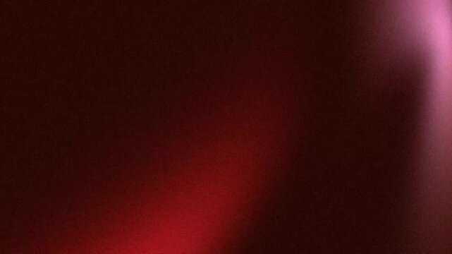 Abstract Red and Pink Light Leak Shimmering on Cinematic Dark Textured Background with Retro Lo-Fi Analog Film Grain Aesthetic