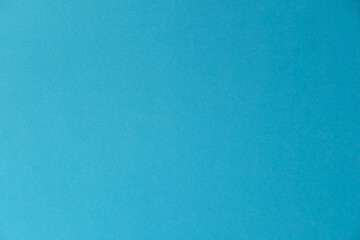 Naklejka premium Blue color texture and background with a smooth surface for minimal design, calm tranquil tone, ideal as an abstract backdrop in compositions