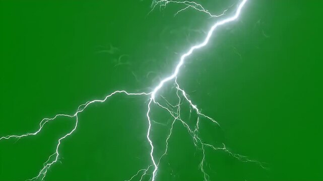 Electric Bolt on Green Background - A bright white lightning bolt flashes across a vibrant green screen background.