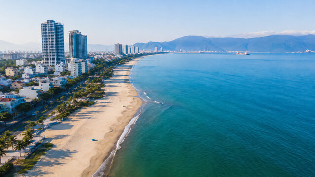 Aerial coastal city beach in Vietnam with high rises and calm blue bay .generative AI