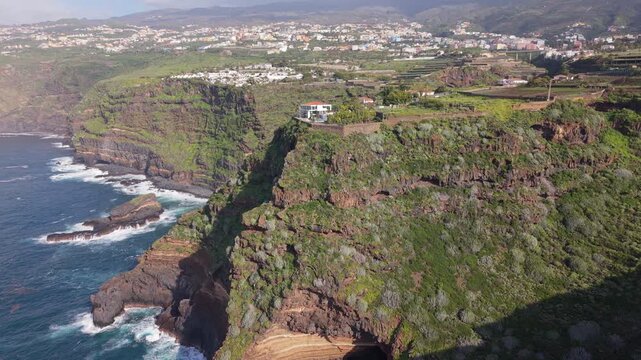 Aerial drone footage of the stunning coastal cliffs of Santa Ursula in North Tenerife, Spain, overlooking the Atlantic Ocean