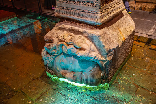 Ancient medusa head in basilica cistern istanbul - intricate stone carving