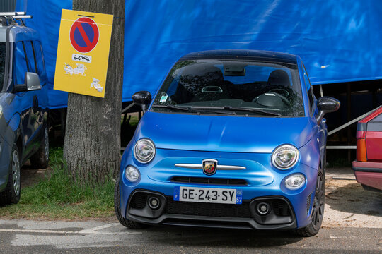 Nancy, France - April 23rd 2022 : View on a matte blue Abarth 595 Competizione parked on a street. The Abarth 595 is a sports car based on the Fiat 500, transformed into a sportier version by Abarth.