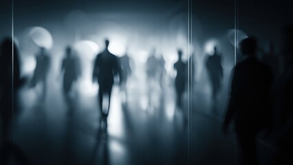 Fototapeta premium Silhouettes of people walking through dark blurred crowd in foggy