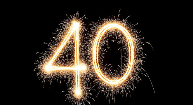 Vibrant sparkler effect forming the number 40, symbolizing a 40th birthday or anniversary celebration against a dark backdrop.