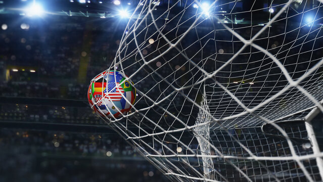 A soccer ball covered with multiple national flags symbolizing an international football tournament in soccer goal net in soccer stadium.