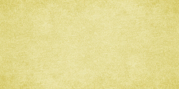 Light yellow textured paper background with subtle vintage grain effect for card design, scrapbooking and backdrop. A high quality, seamless light yellow paper texture, fine grained vintage surface