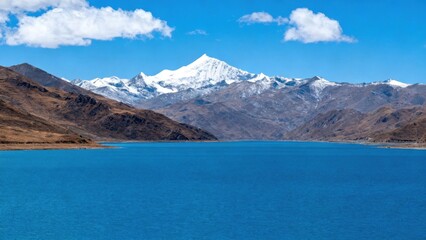 Fototapeta premium Mountain lake with snow peak
