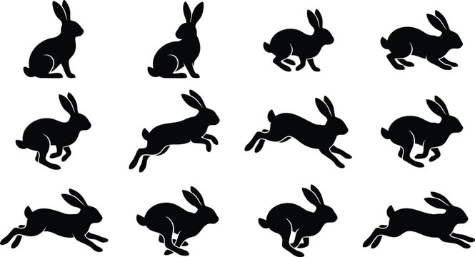 Set of black silhouettes of jumping and running rabbits