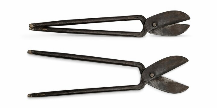 Heavy duty metal tin snips isolated on a white background for cutting metal sheets.