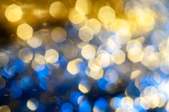 Colorful lights create bokeh effect during nighttime in a festive setting