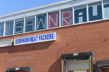 Obraz premium ghost sign of Dominion Meat Packers at former meat processing plant located at 2255 St Clair Av W, Toronto