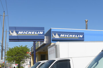 Obraz premium road side signs of Michelin, a French multinational tyre manufacturer, located here at Dufferin Motors & Tires, 2325 St Clair Av W, Toronto