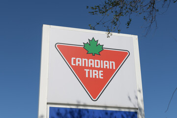 Naklejka premium corporate logo sign of Canadian Tire, a department store, located at 2129 St Clair Av W, Toronto
