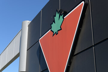Naklejka premium corporate logo sign of Canadian Tire, a department store, located at 2129 St Clair Av W, Toronto
