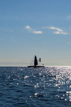 Autonomous Sailing Drone Silhouette on Open Ocean