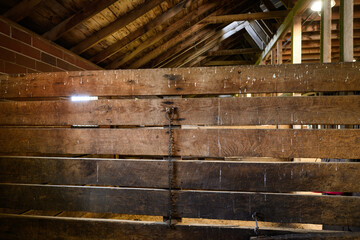Interior wood beams on old horse stable barn © Schaefer Photography